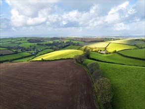 Lights and Shadows over Fields and Farms from a drone, Devon, England, United Kingdom, Europe