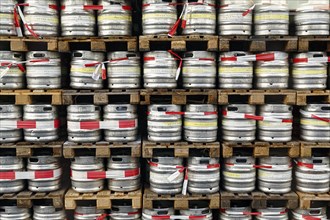 Pallets stacked, many beer barrels labelled with deposit, full-size, Warsteiner Brewery, Warstein,