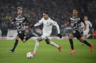 Justin Njinmah SV Werder Bremen SVW (17) on the ball in front of Atakan Karazor VfB Stuttgart (16)