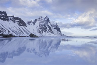 Vestrahorn mountain in Stokksnes, part of the mountains Klifatindur in winter, Iceland, Europe