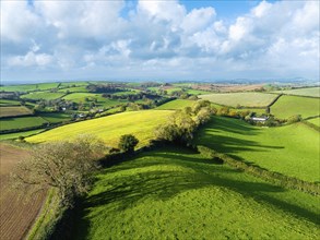 Lights and Shadows over Fields and Farms from a drone, Devon, England, United Kingdom, Europe