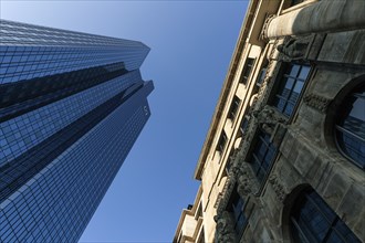 Glass facade of Deutsche Bank, next to it facade of an old house, banking district, Westend,