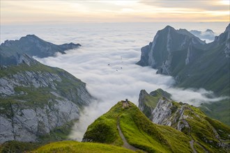 Alpstein, valley of Meglisalp at sunrise, high fog in the valley, SÃ¤ntis, Appenzell Ausserrhoden,