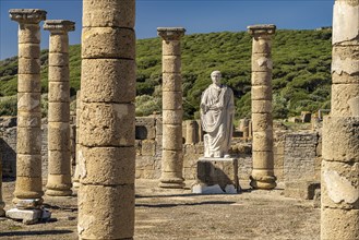 Trajan statue and basilica of the Roman ruins of Baelo Claudia in Bolonia, Tarifa, Costa de la Luz,