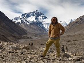 Man in front of Mt Everest summit, Tibet, China, Asia