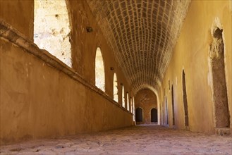 Arcade, tunnel vault, ochre walls, Arkadi, Orthodox Monastery, National Monument, Rethimnon