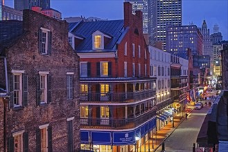 Shops, bars and restaurants at night in Bourbon Street, French Quarter, Vieux Carré in the city New