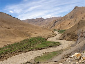 Dried up riverbed in mountain landscape, highlands of Tibet, China, Asia