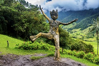 Wooden statue, Cocora valley, Unesco site coffee cultural landscape, Salento, Colombia, South