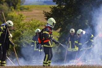 During controlled field fires, the firefighters were able to test various extinguishing methods,