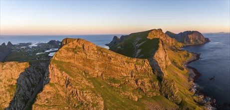 Coast and mountains in the evening light, Vaeroy Island, Vaeroy, Lofoten, Norway, Europe