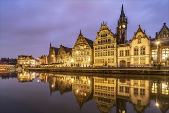 Medieval guild houses of Graslei Kai on the river Leie at dusk, Ghent, Belgium, Europe