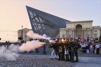 Combat drill and battle reenactment in front of the Dresden Military History Museum. Numerous