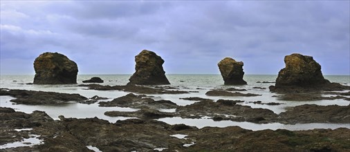 Sea stacks at the Plage des Cinq Pineaux at Saint-Hilaire-de-Riez, La Vendée, Pays de la Loire,