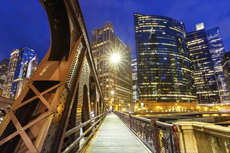 Skyline skyscrapers skyscrapers with Franklin-Orleans Street Bridge bridge at night in Chicago,