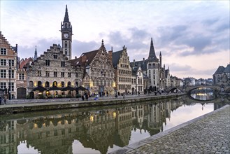 Medieval guild houses of Graslei Kai on the river Leie at dusk, Ghent, Belgium, Europe