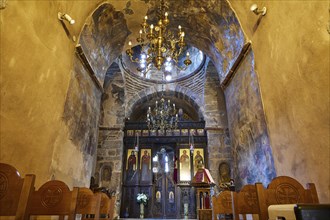 Super wide angle, interior church, icons, tunnel vault, ochre walls, chandelier, altar wall, rows