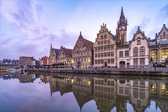 Medieval guild houses of Graslei Kai on the river Leie at dusk, Ghent, Belgium, Europe