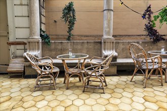 Roof terrace in a hostel, hotel, seating, simple bamboo furniture, Gracia neighbourhood, Barcelona,