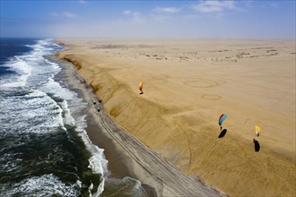 Paragliding on the dune at Henties Bay, Henties Bay, Namibia, Africa