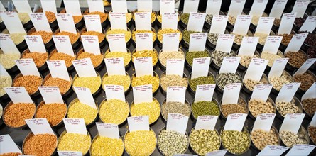 Samples of pulses kept on display inside a shop at a wholesale market ahead of the presentation of