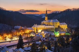 Winter evening in the Müglitz valley, impressively illuminated Weesenstein Castle at the blue hour,