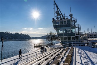 Winter in the Ruhr area, Lake Baldeney, snow-covered, partly frozen lake, regatta tower, grandstand