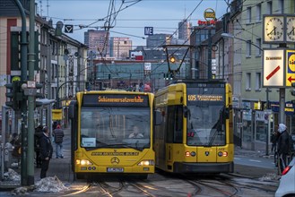 Ruhrbahn tram, on Altendorfer StraÃŸe, in the background the skyline of Essen city centre, rush