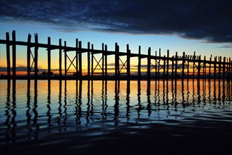 Myanmar, Wooden bridge at Inle Lake at sunset, Inle Lake, Myanmar, Asia