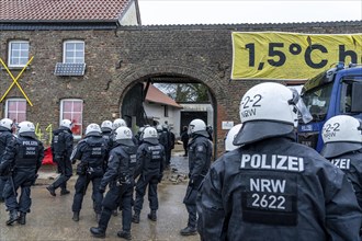 2nd day of the eviction of the Lützerath hamlet, occupied buildings of the former farm, by climate