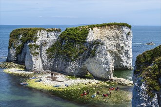 People on kayaks and paddleboards, White Cliffs. Old Harry Rocks Jurassic Coast, Dorset Coast,