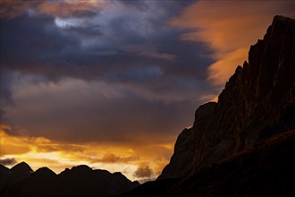 Montafon mountains with dramatic cloudy sky at sunset, Tschagguns, RÃ¤tikon, Montafon, Vorarlberg,