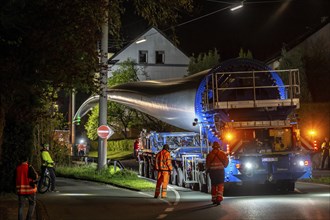 Transport of a 68 metre long, 22 tonne blade of a wind turbine, here in Schwelm, with a