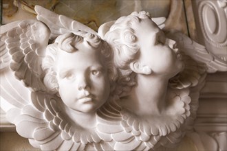 Close up of cherubs angels in village parish church of Saint Michael, Wilsford cum Lake, Wiltshire,