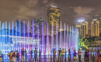 Colored fountain in the city park in Kuala Lumpur, Malaysia, Asia