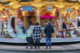 Pre-Christmas season, Christmas market at Kennedyplatz in the city centre of Essen, carousel,