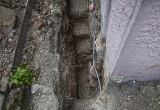 Exposed old sewage pipes, trench, Stuttgart, Baden-Württemberg