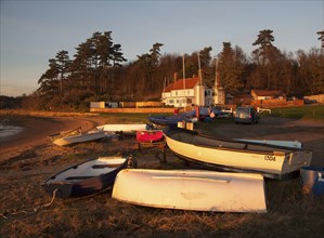 Dinghies outside Ramsholt Arms pub, River Deben, Ramsholt, Suffolk, England, United Kingdom, Europe