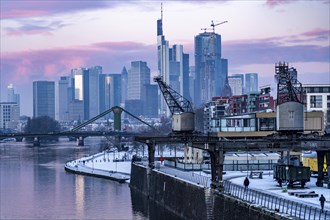 The skyline of Frankfurt am Main, skyscrapers of the banking district, historic harbour cranes at