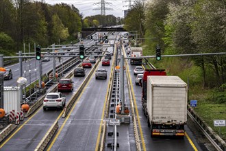 Weighing and barrier system on the A42 motorway, in front of the dilapidated motorway bridge over