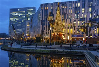 Christmas market, at the Kö-Bogen shopping centre, in the city centre of Düsseldorf, at the back