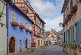 Well-kept half-timbered houses and floral decorations characterise the town centre of Eguisheim in