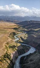 Mountain landscape with river in a narrow mountain valley in autumn, Little Naryn or Kichi-Naryn,