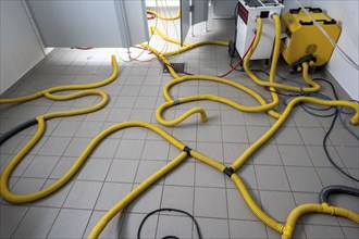 Water damage restoration, dehumidification, after flooding of a building, vacuum drying