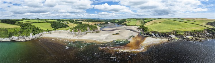 Panorama of Cliffs over Mothecombe Beach and Red Cove from a drone, River Emme, Mothecombe,