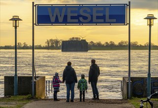 Rhine flood, riverside promenade in Wesel, the river water is already spilling onto the paths,