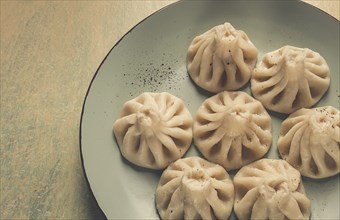 Traditional Georgian dish, Khinkali, Kalakuri, top view, rustic style, no people