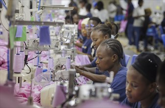 BENIN TEXTILE CORPORATION BENIN, Seamstresses in a textile factory in the industrial area near