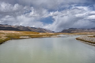 Mountain lake in the high mountains, Ak Shyrak Mountains, near Kumtor, Kara-Say, Tian Shan,