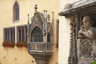 Façade with oriel of the Old Town Hall, 16th century, on the right part of the old staircase portal